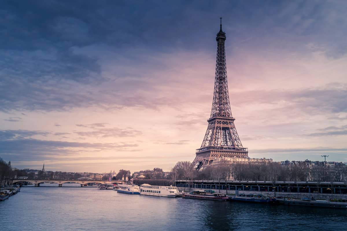The Eiffel Tower and the Seine in Paris at dusk