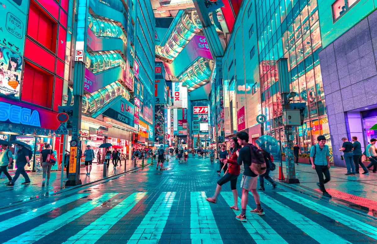 A busy, neon-lit shopping street in Tokyo