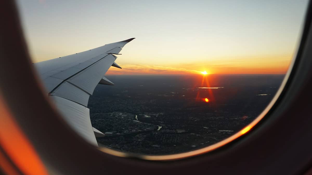 View of the sunset through an aircraft window